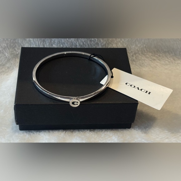 Coach Jewelry - NWT Coach Silver Bangle with Logo Charm